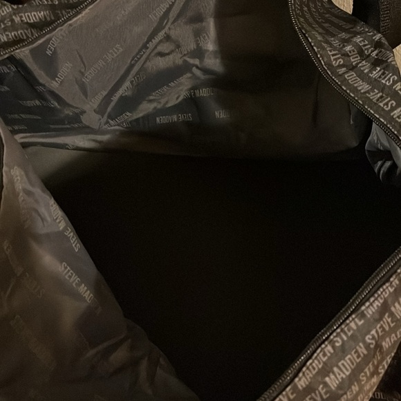 Black with Steve Madden written on it in gray large duffle bag - Picture 5 of 5